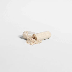 MIANIMED premium skincare capsule with powdered content on a white background