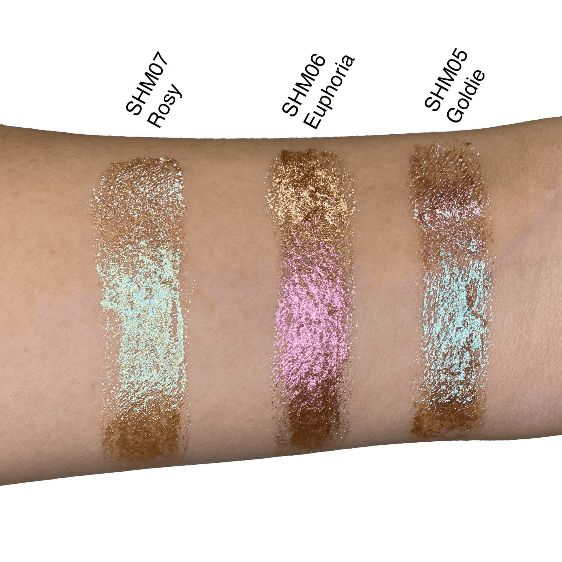 MIANIMED premium skincare swatches: SHM07 Rosy, SHM06 Euphoria, SHM05 Goldie, showcasing vibrant and shimmering colors on arm