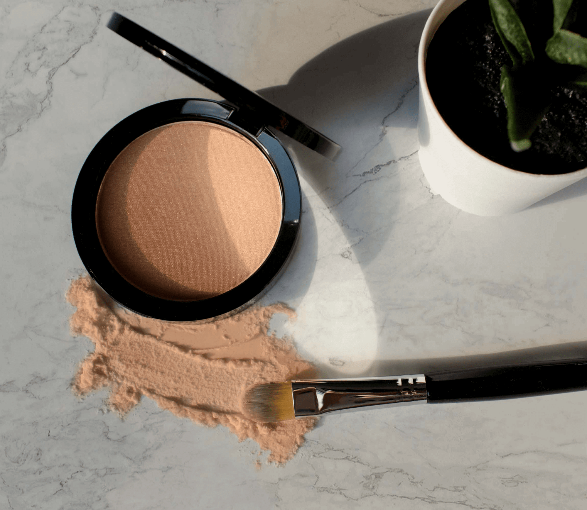 MIANIMED Premium skincare compact powder open showing peach-colored makeup inside black container.