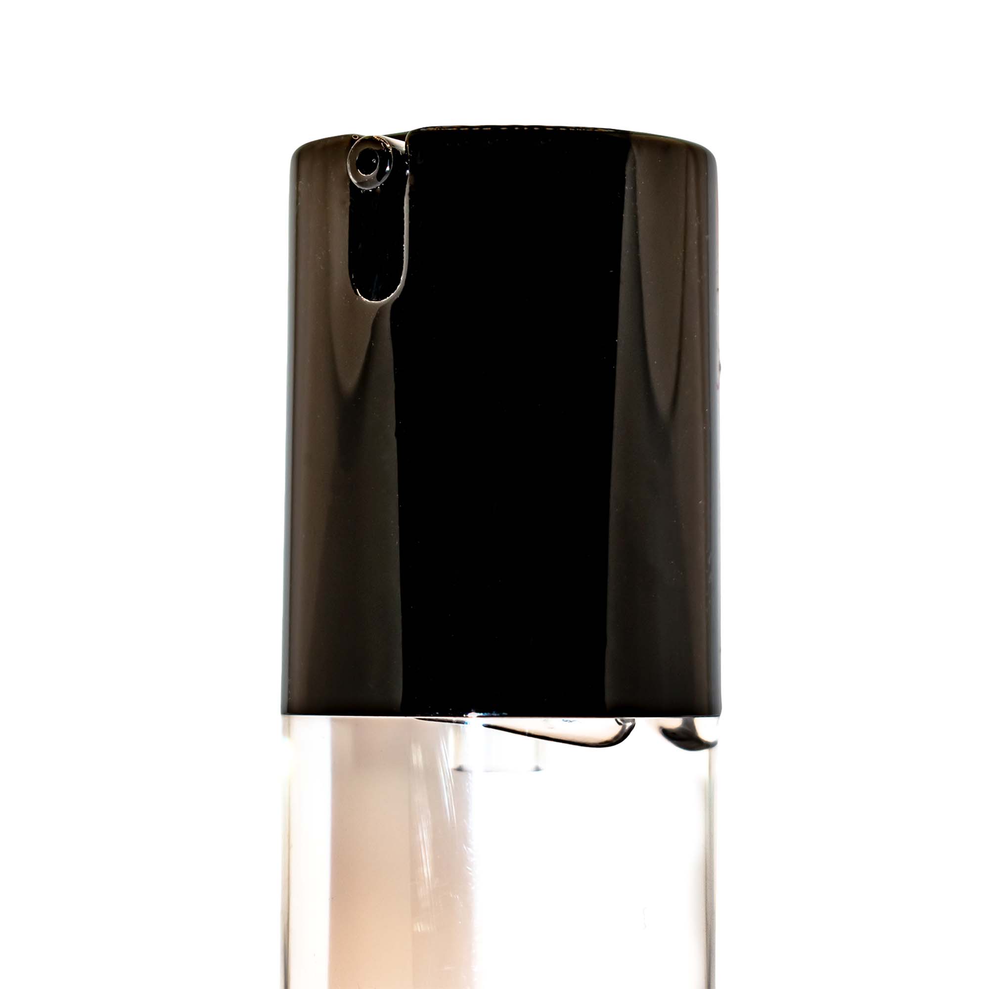 Close-up of MIANIMED premium skincare pump bottle with a sleek black cap.