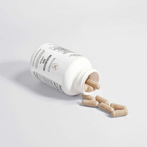 MIANIMED premium skincare supplement bottle with capsules.