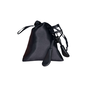 Black premium MIANIMED skincare bag with drawstring closure and attached accessories