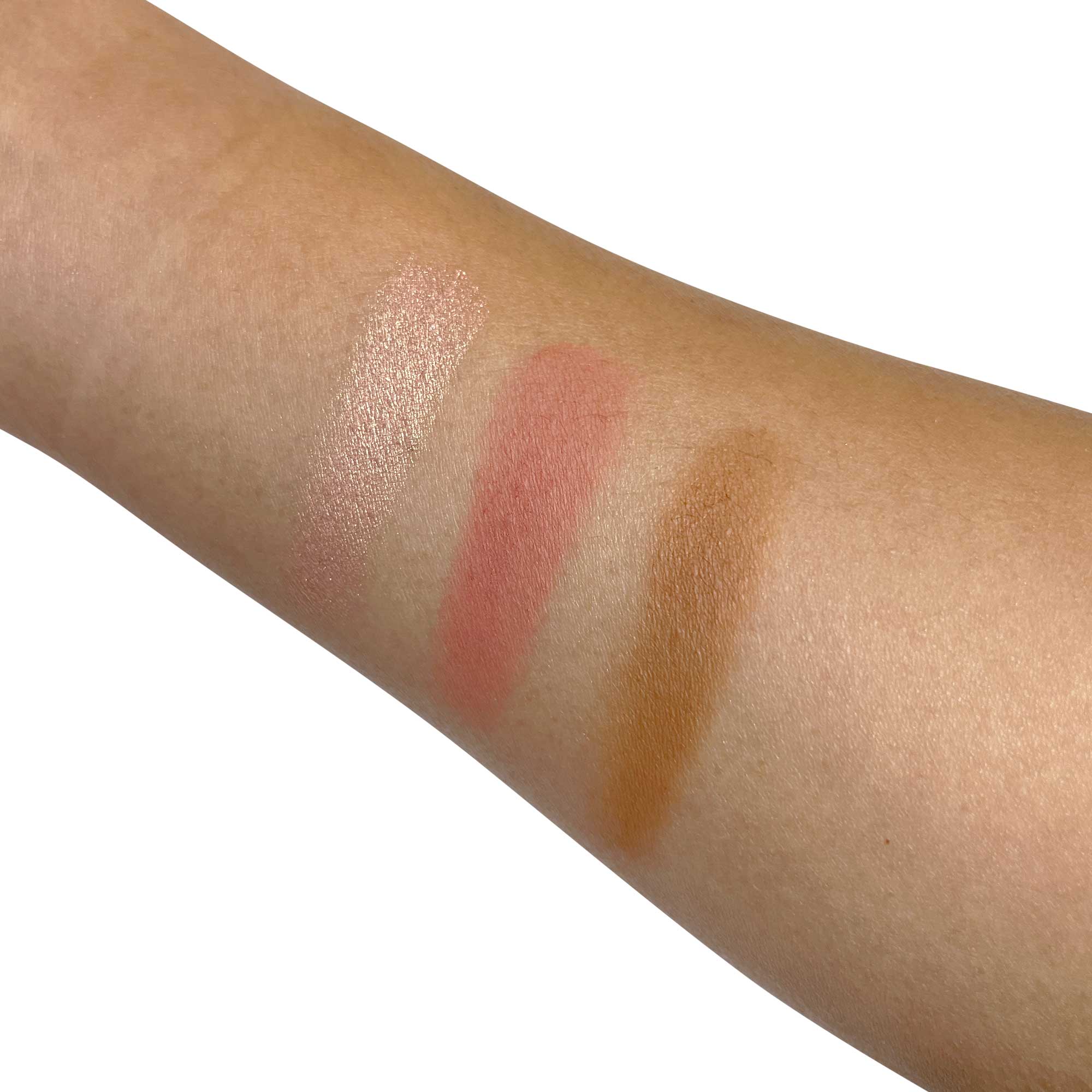 MIANIMED premium skincare swatches on arm showing three different shades of product