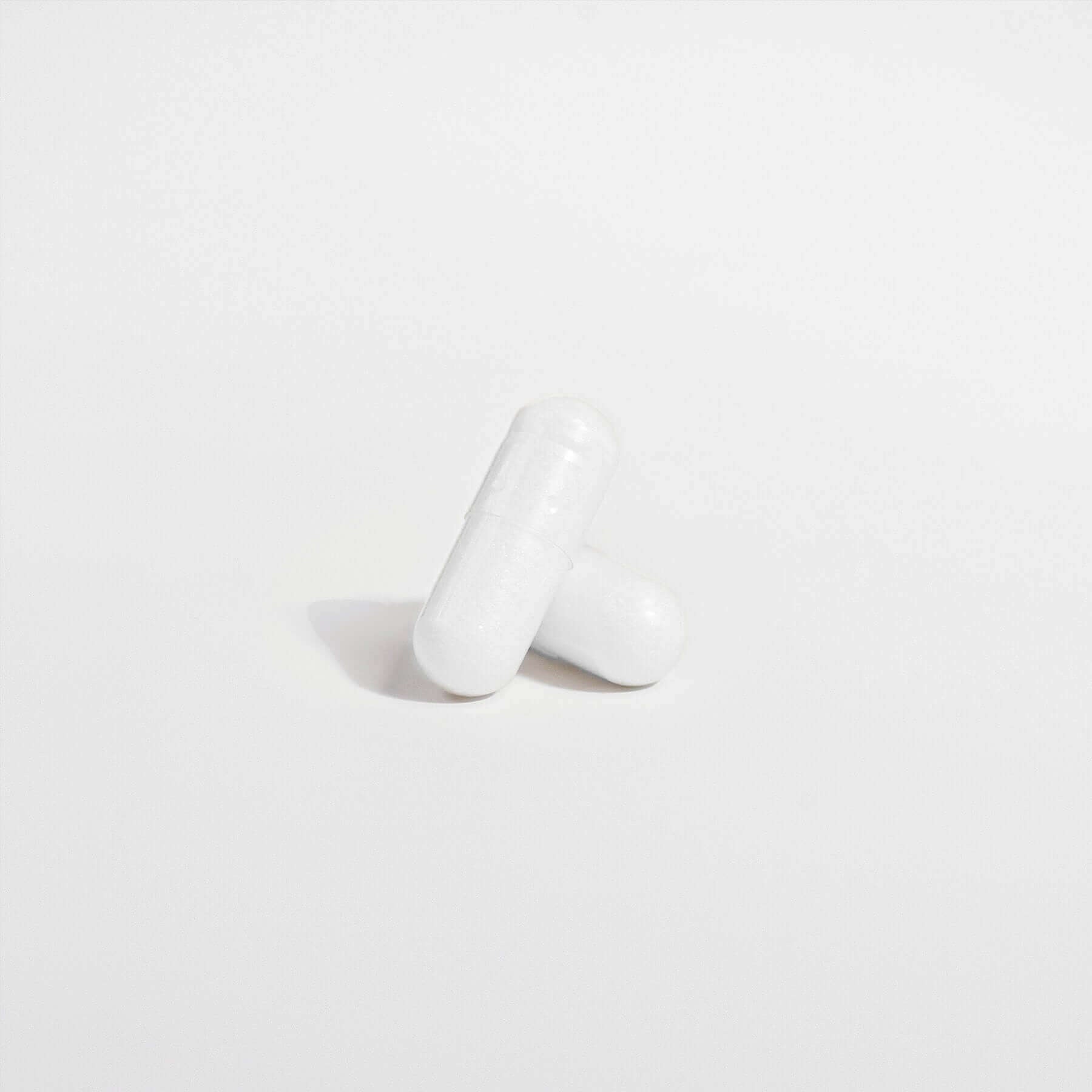 MIANIMED premium skincare capsules against a white background.