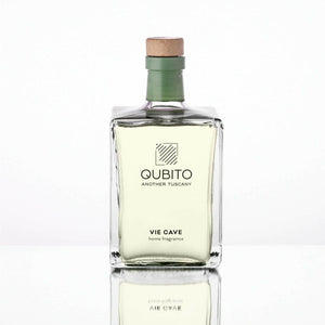 Qubito Vie Cave home fragrance bottle with green cap and wooden stopper, showcasing premium packaging.