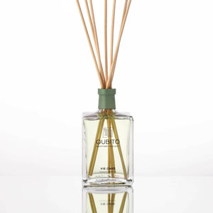 Premium MIANIMED skincare essential oil diffuser with bamboo sticks in a clear glass bottle.