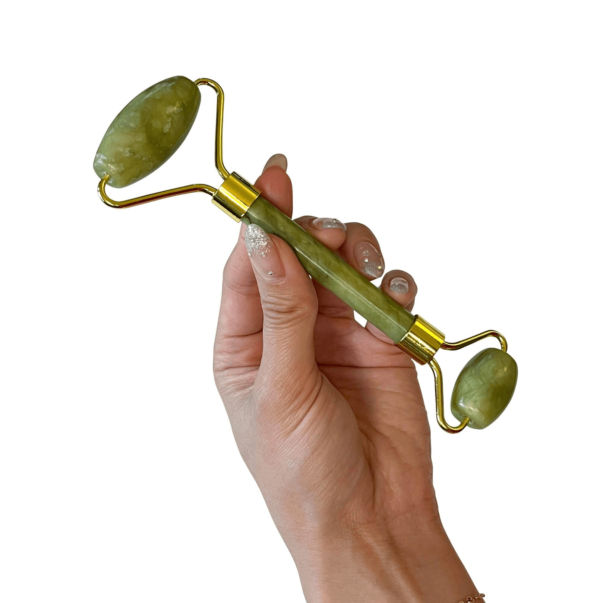 Hand holding MIANIMED premium green jade facial roller, skincare tool.