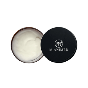 MIANIMED premium skincare cream in an open container with black lid displaying the MIANIMED logo.