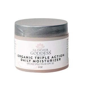 Glimmer Goddess Organic Triple Action Daily Moisturizer with SPF 30 in 2 oz jar.